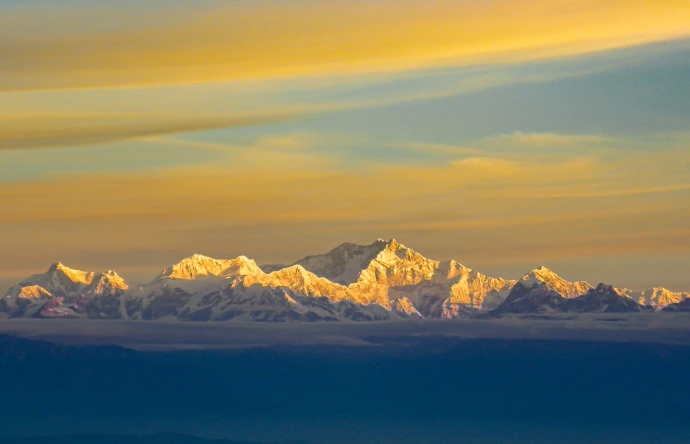 snow covered mountain under blue sky during daytime
